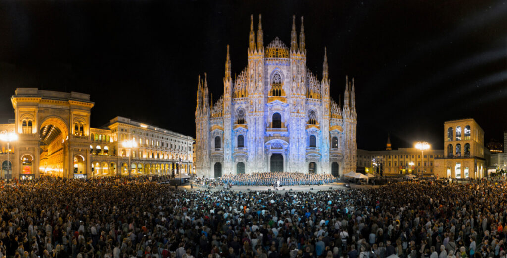Donald Lawrence conducts a 500-member Italian choir in front of the Duomo di Milano Cathedral in Milan, Italy, with a crowd of 40,000 filling the square in September, 2015.