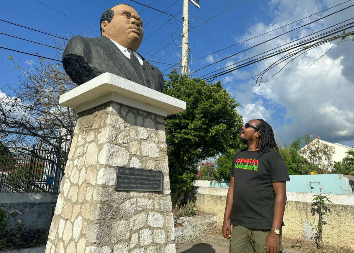 Steven Golding, president of the Universal Negro Improvement Association and African Communities League, a black nationalist fraternal organisation founded in Jamaica by Marcus Garvey, admires a bust of Garvey in Kingston, Jamaica, on 21st March, 2023. 