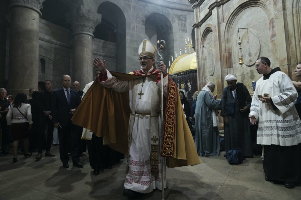 Latin Patriarch of Jerusalem Pierbattista Pizzaballa leads the Easter Sunday Mass at the Church of the Holy Sepulchre, where many Christians believe Jesus was crucified, buried and rose from the dead, in the Old City of Jerusalem, on Sunday, 9th April, 2023.