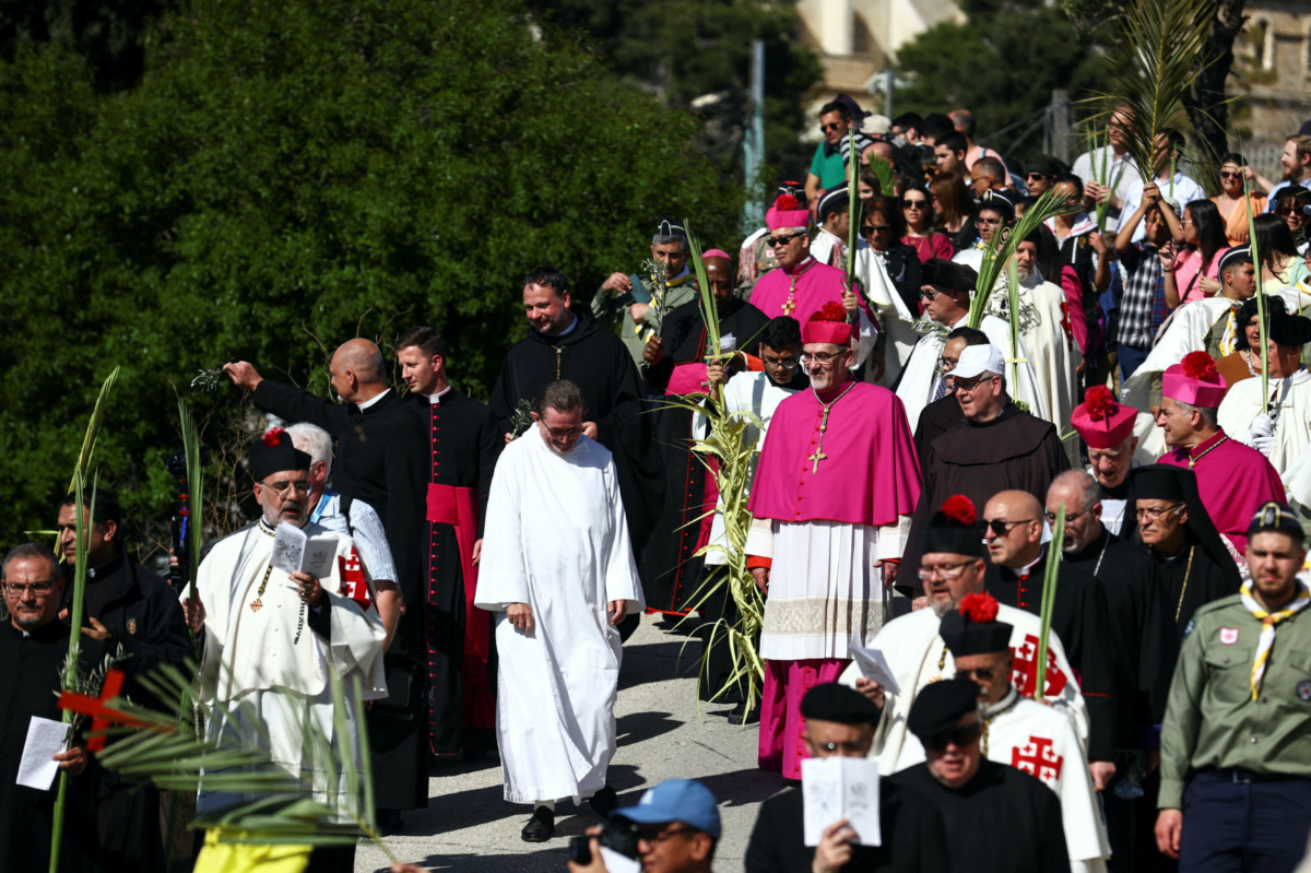 Latin Patriarch of Jerusalem Pierbattista Pizzaballa leads a Palm Sunday procession on the Mount of Olives in Jerusalem, on 2nd April, 2023. 