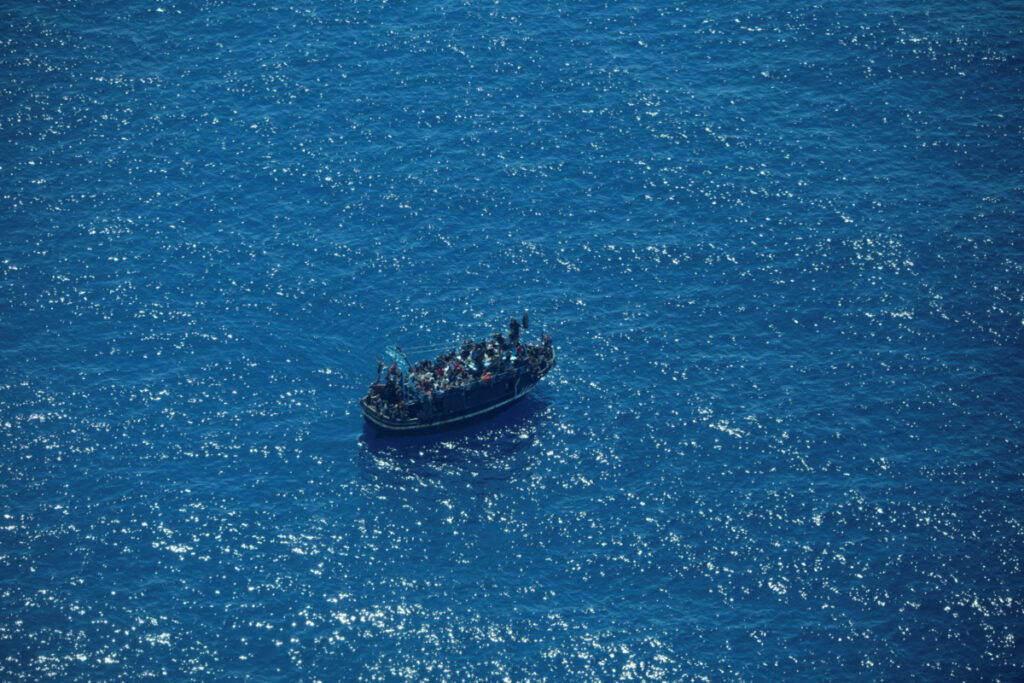 The boat in distress with about 400 people on board is pictured in Central Mediterranean Sea in this handout obtained by Reuters on 10th April, 2023.