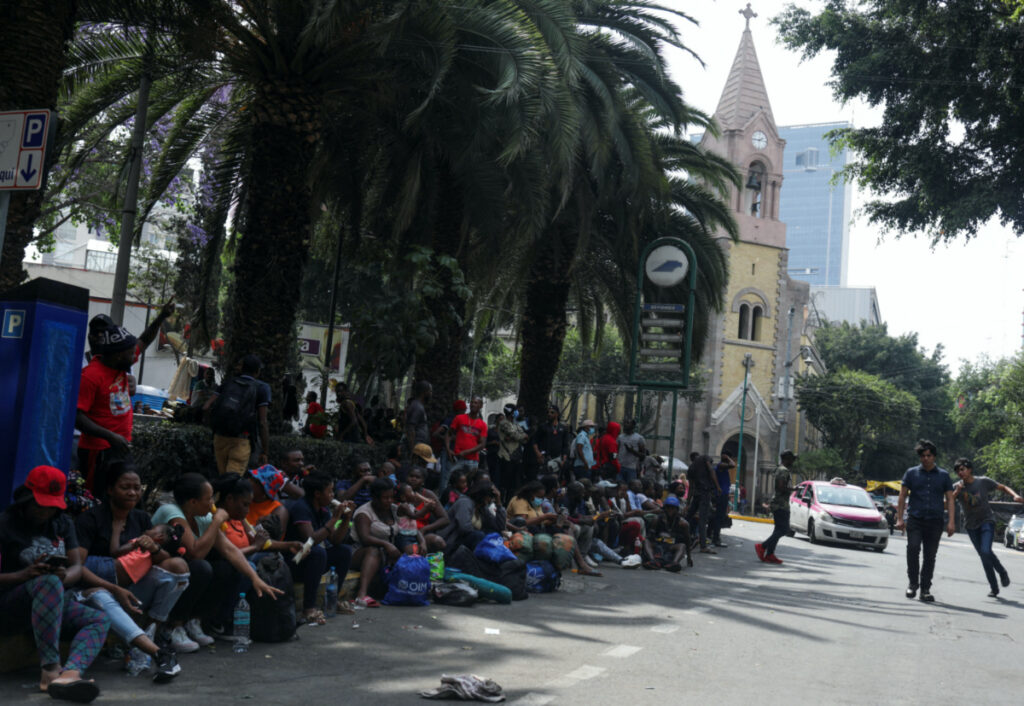Migrants, mostly from Haiti, gather at the Giordano Bruno park as they wait for a permit or Visitor Card for Humanitarian Reasons that would allow them to continue their journey to the border between Mexico and the United States, in Mexico City, Mexico, on 4th April, 2023.