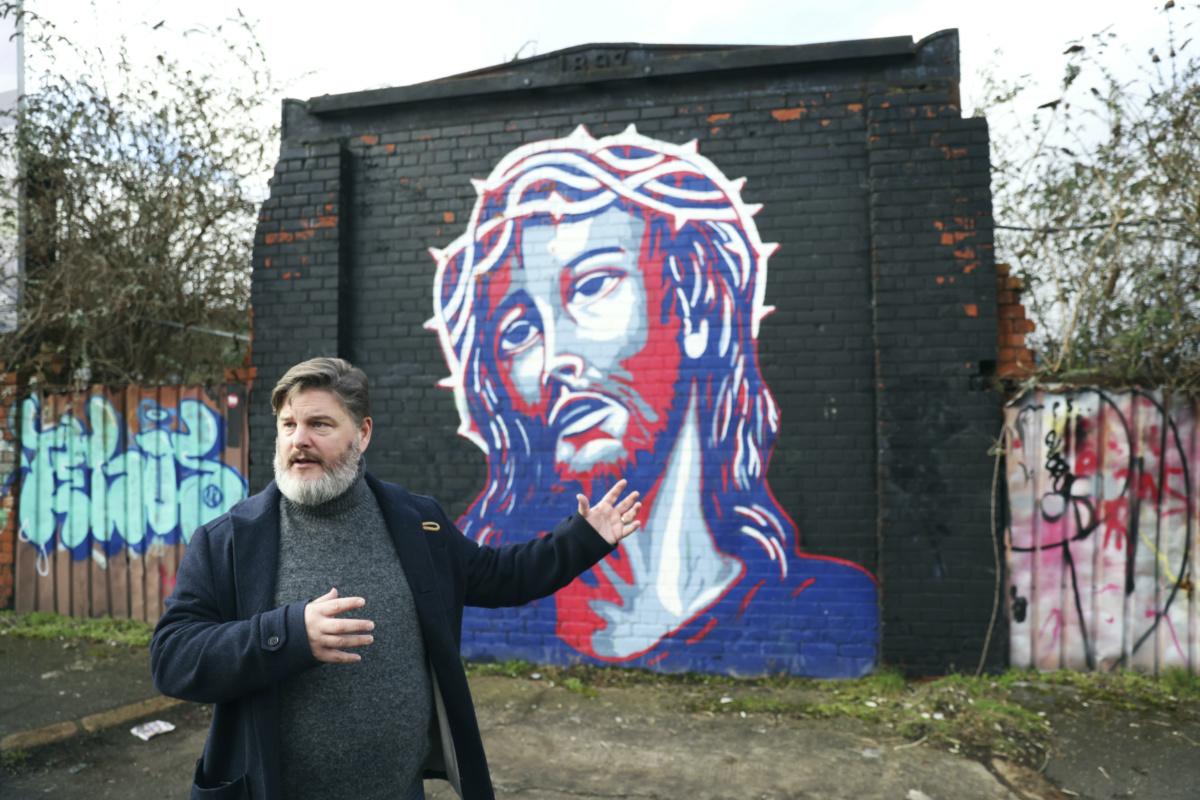 Jonny Clark, program manager for public theology at Corrmeela, an organisation that has worked for decades toward reconciliation in Northern Ireland, visits the peace walls in west Belfast, Northern Ireland, on Saturday, 28th January, 2023. 