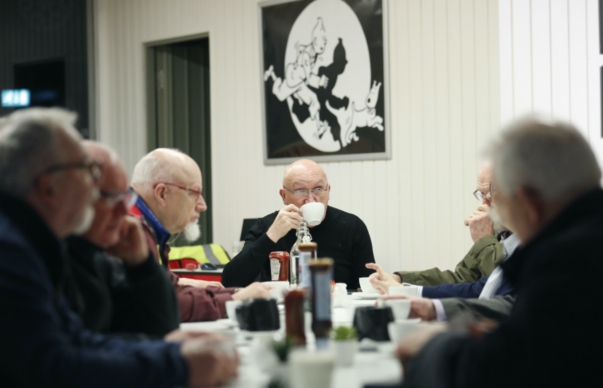 The Rev. Bill Shaw, centre, CEO of the 174 Trust, which oversees The Duncairn and the Building Bridges Community Boxing Club, sits with Catholic and Protestant clergy at Duncairn for a prayer gathering, in north Belfast, Northern Ireland, on Friday, 27th January, 2023. 