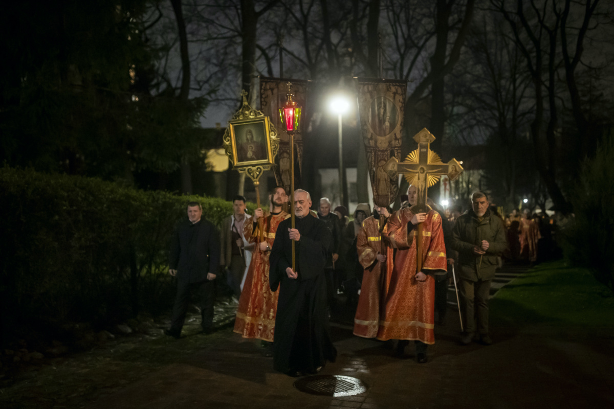 Lithuanian Orthodox priests and believers walk in the Easter procession at the Orthodox Church of the Holy Spirit in Vilnius, Lithuania, shortly after midnight, on Sunday, 16th April, 2023.