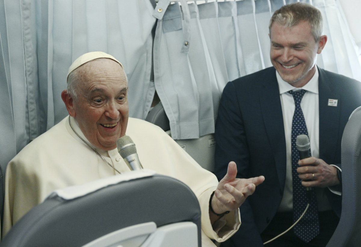 Pope Francis meets the journalists during a press conference aboard the airplane directed to Rome, at the end of his pastoral visit to Hungary, on Sunday, 30th April, 2023.