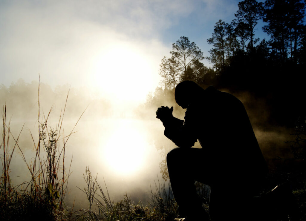 Praying outdoors