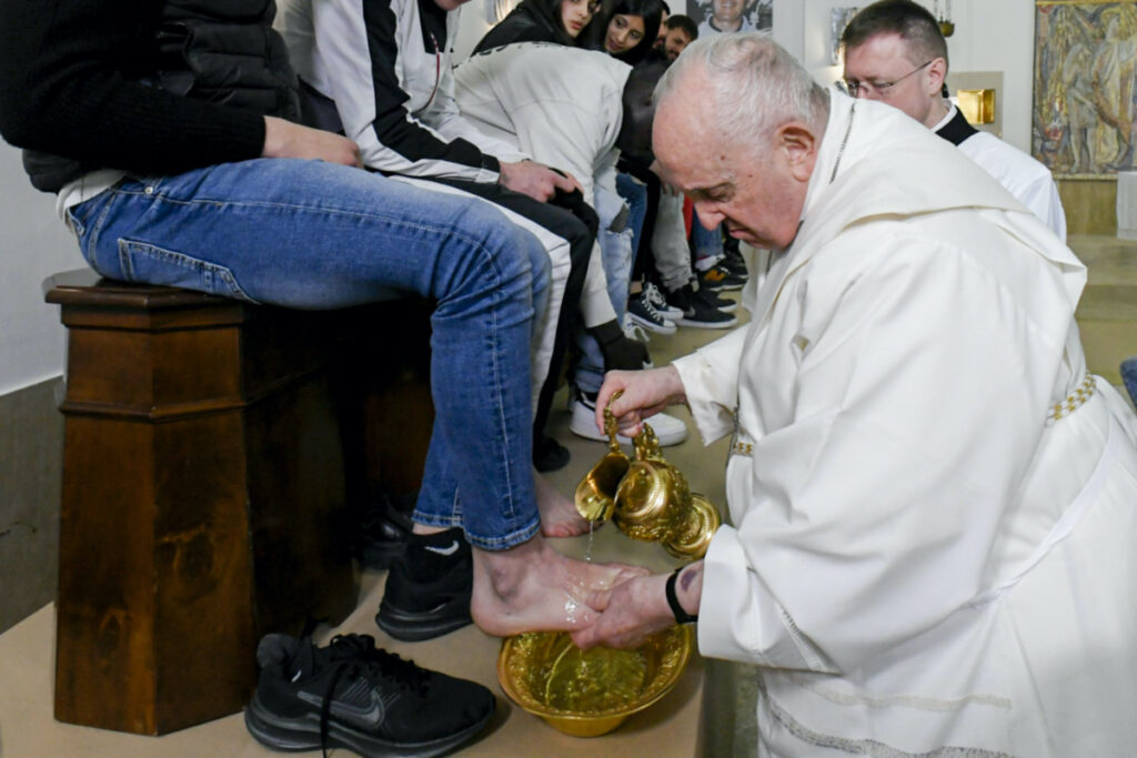 In this picture made available by Vatican Media Pope Francis washes the feet of the inmates of Rome's penitentiary of Casal del Marmo, on Thursday, 6th April, 2023.