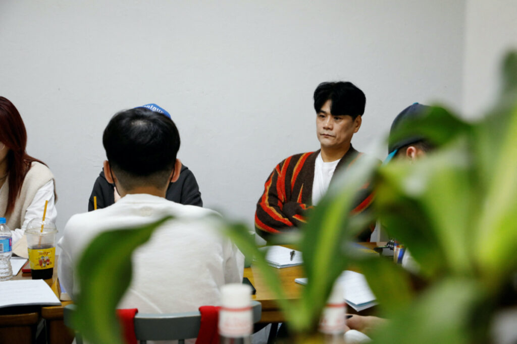 Choi Jin-mook, 48, chief director of Drug Addiction Rehabilitation Centre and visiting professor of Department of Addiction Rehabilitation and Social Welfare at Eulji University, listens to a recovering drug addict during a group counselling for drug addicts in Incheon, South Korea, on 1st April, 2023.