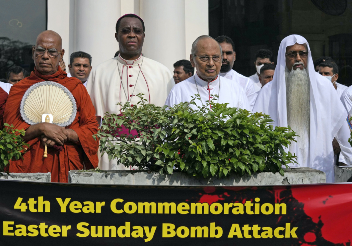 Cardinal Malcolm Ranjith, second right, archbishop of Colombo, stands in silence with other religious leaders during a silent protest to mark the fourth year commemoration of the 2019, Easter Sunday bomb attacks on Catholic churches, in Colombo, Sri Lanka, on Friday, 21st April 2023. 