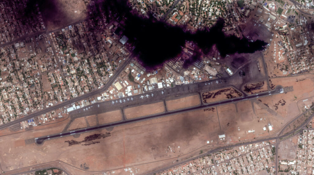 Satellite image shows smoke and an overview of Khartoum International Airport in Khartoum, Sudan, on 16th April, 2023, in this handout image.