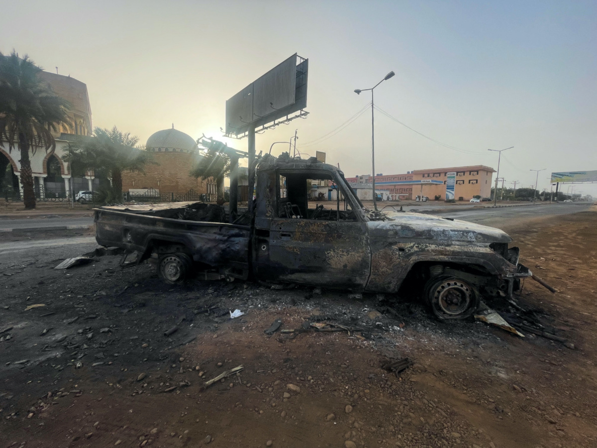 A burned vehicle is seen in Khartoum, Sudan, on 26th April, 2023. 