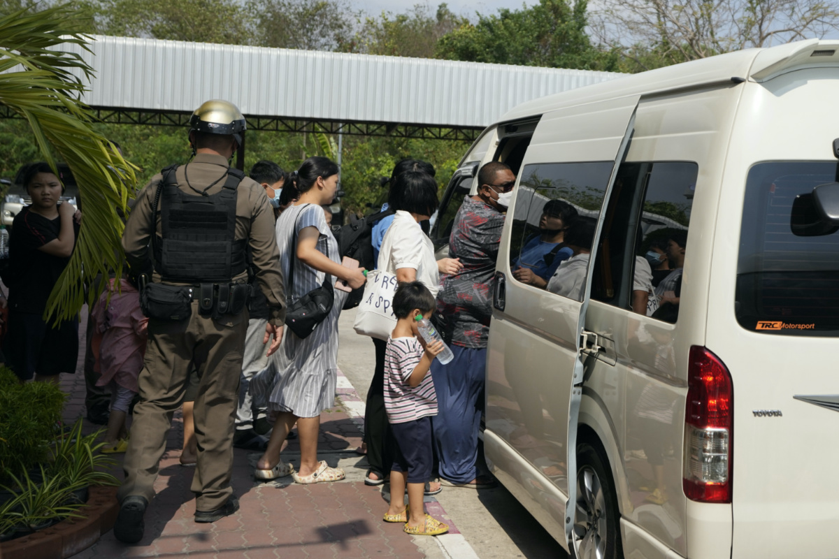 Members of the Shenzhen Holy Reformed Church, also known as the Mayflower Church, leave from the Nongprue police station on their way to Pattaya Provincial Court in Pattaya, Thailand, on Friday, 31st March, 2023. 