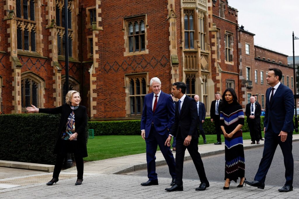 Ireland's Prime Minister Leo Varadkar, former US President Bill Clinton, former US Secretary of State Hillary Clinton, British Prime Minister Rishi Sunak and his wife Akshata Murty walk together, on the day of an event marking the 25th anniversary of the Good Friday Agreement at Queen's University, in Belfast, Northern Ireland, on 19th April, 2023