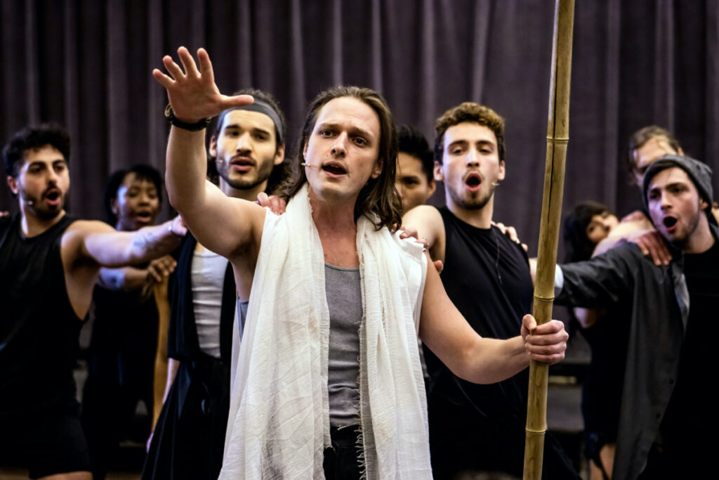 Max Keunzer, centre, portrays Jesus while workshopping “His Story: The Musical" in New York City.