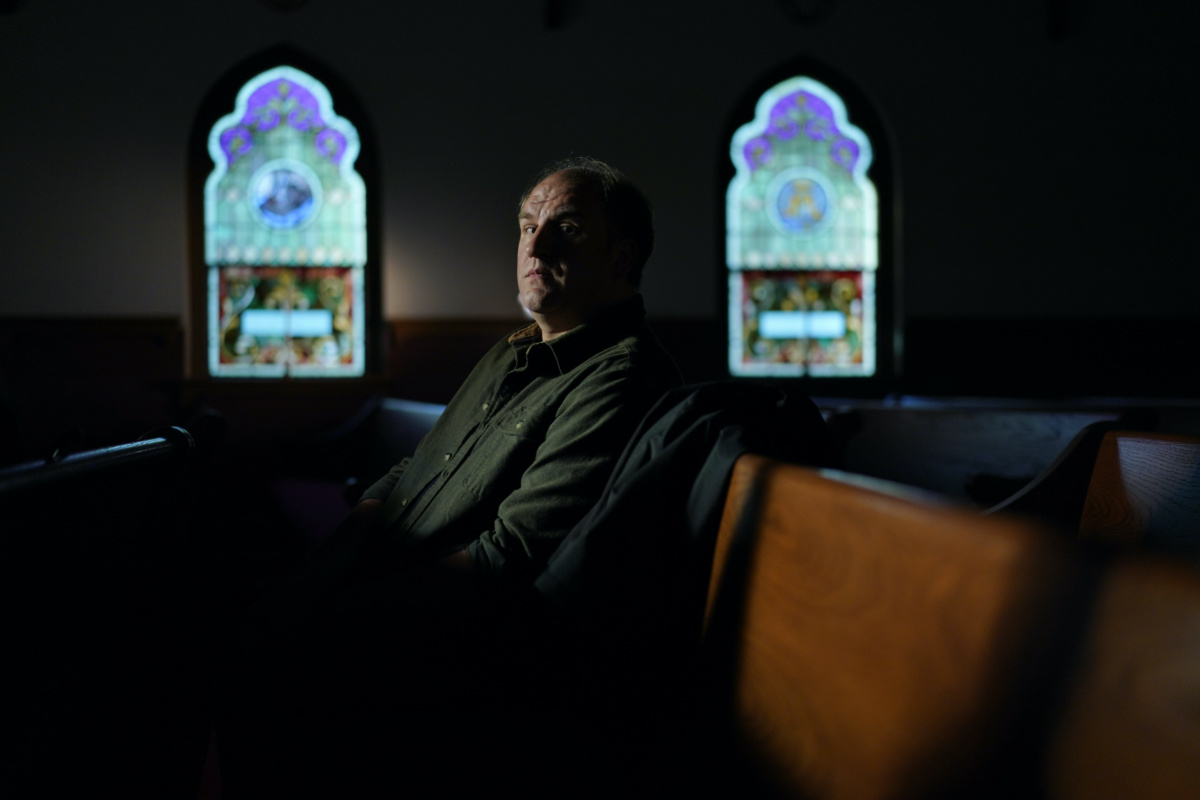 Gerald Groff, a former postal worker whose case will be argued before the Supreme Court, sits in a pew after a television interview with the Associated Press at a chapel at the Hilton DoubleTree Resort in Lancaster, Pennsylvania, on Wednesday, 8th March, 2023.