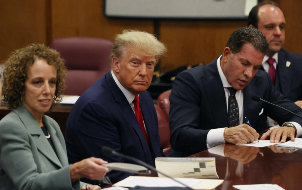 Former US President Donald Trump is accompanied by members of his legal team, Susan Necheles and Joe Tacopina, as he appears in court for an arraignment on charges stemming from his indictment by a Manhattan grand jury, on 4th April, 2023.