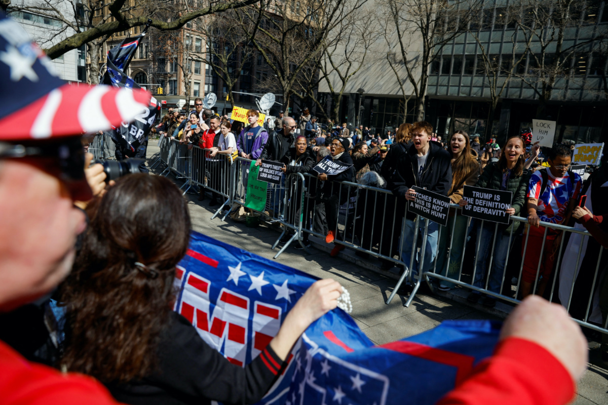 Anti-Trump protesters demonstrate facing Trump supporters outside Manhattan Criminal Courthouse on the day of former US President Donald Trump's planned court appearance, on 4th April, 2023