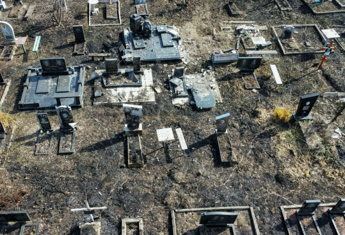 A view shows graves damaged by a Russian military strikes, amid Russia's attack on Ukraine, at a cemetery in Kharkiv, Ukraine, on 28th March, 2023. 
