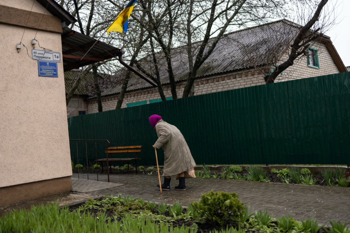 A local resident arrives to see a doctor at a clinic in the newly liberated village of Vyshneva, near Kharkiv in eastern Ukraine, on 21st April, 2023