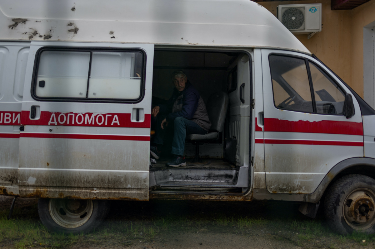A healthcare worker sits inside an ambulance in the liberated town of Izium, in Kharkiv region in eastern Ukraine, on 21st April, 2023.