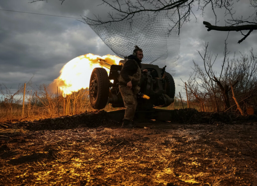 Ukrainian service members from a 3rd separate assault brigade of the Armed Forces of Ukraine, fire a howitzer D30 at a front line, amid Russia's attack on Ukraine, near the city of Bakhmut, Ukraine on 23rd April, 2023.