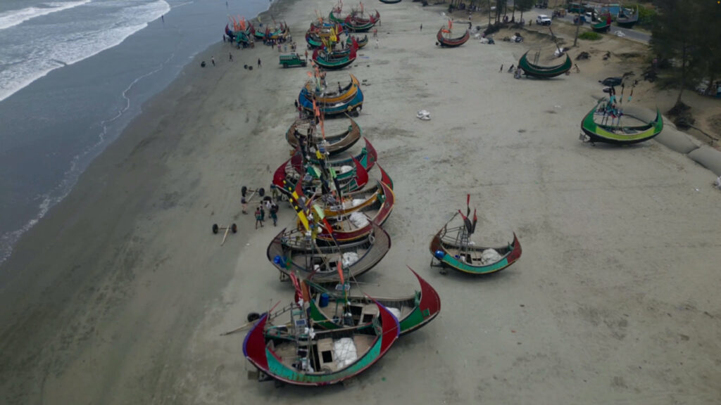 A drone view shows fishermen portaging their boats to safer ground due to Cyclone Mocha, in Teknaf Marine Drive, Cox's Bazar, Bangladesh, on 12th May , 2023, in this screengrab obtained from a handout video