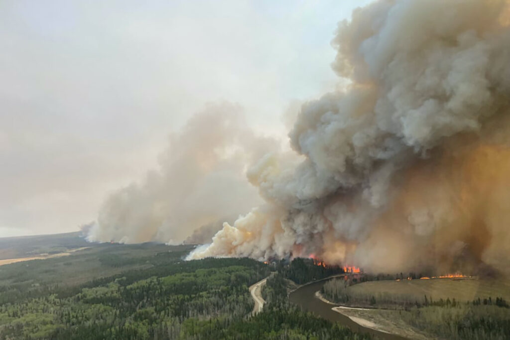 A smoke column rises from wildfire EWF-035 near Shining Bank, Alberta, Canada, on 5th May, 2023.