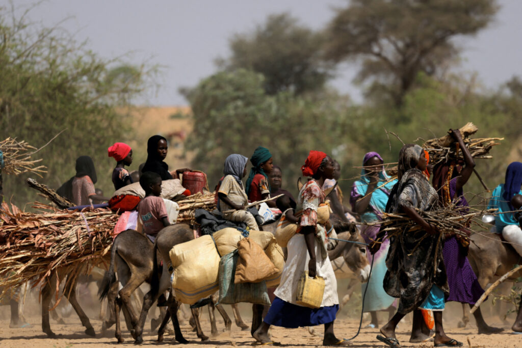 Sudanese refugees who fled the violence in Sudan's Darfur region and newly arrived ride their donkeys looking for space to temporarily settle, near the border between Sudan and Chad in Goungour, Chad, on 8th May, 2023