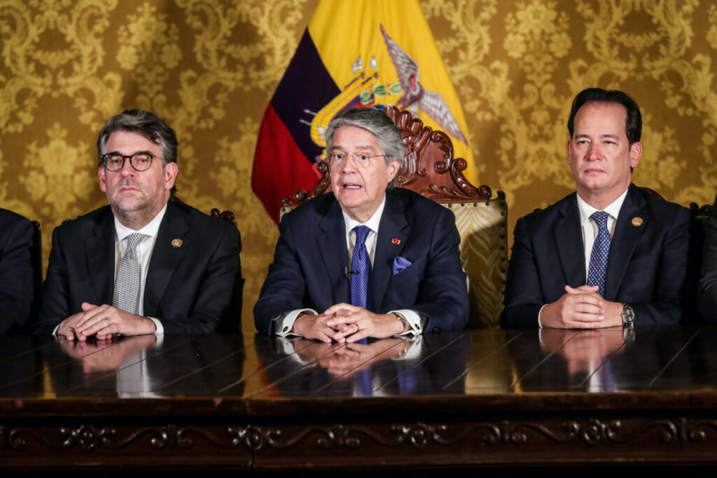 Ecuador's President Guillermo Lasso addresses the nation next to Secretary General of Government Sebastian Corral and Interior Minister Henry Cucalon, after he dissolved the National Assembly by decree, bringing forward legislative and presidential elections, a day after he defended himself in an impeachment hearing, in Quito, Ecuador, on 17th May, 2023