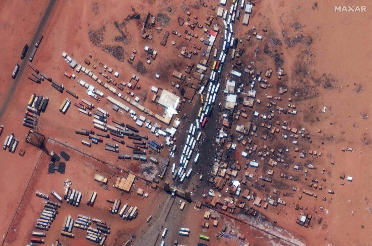 A satellite view shows buses as they wait at the Argeen border between Egypt and Sudan, on 28th April 2023. 