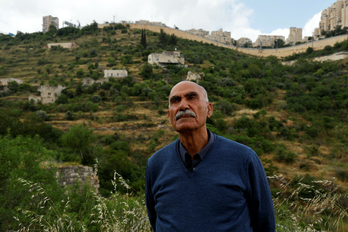 Yacoub Odeh, 83, looks on as he visits the remains of deserted houses in Lifta, a depopulated Palestinian Arab village on the outskirts of Jerusalem where he was born and lived until he was expelled when Israel was established, on 8th May, 2023