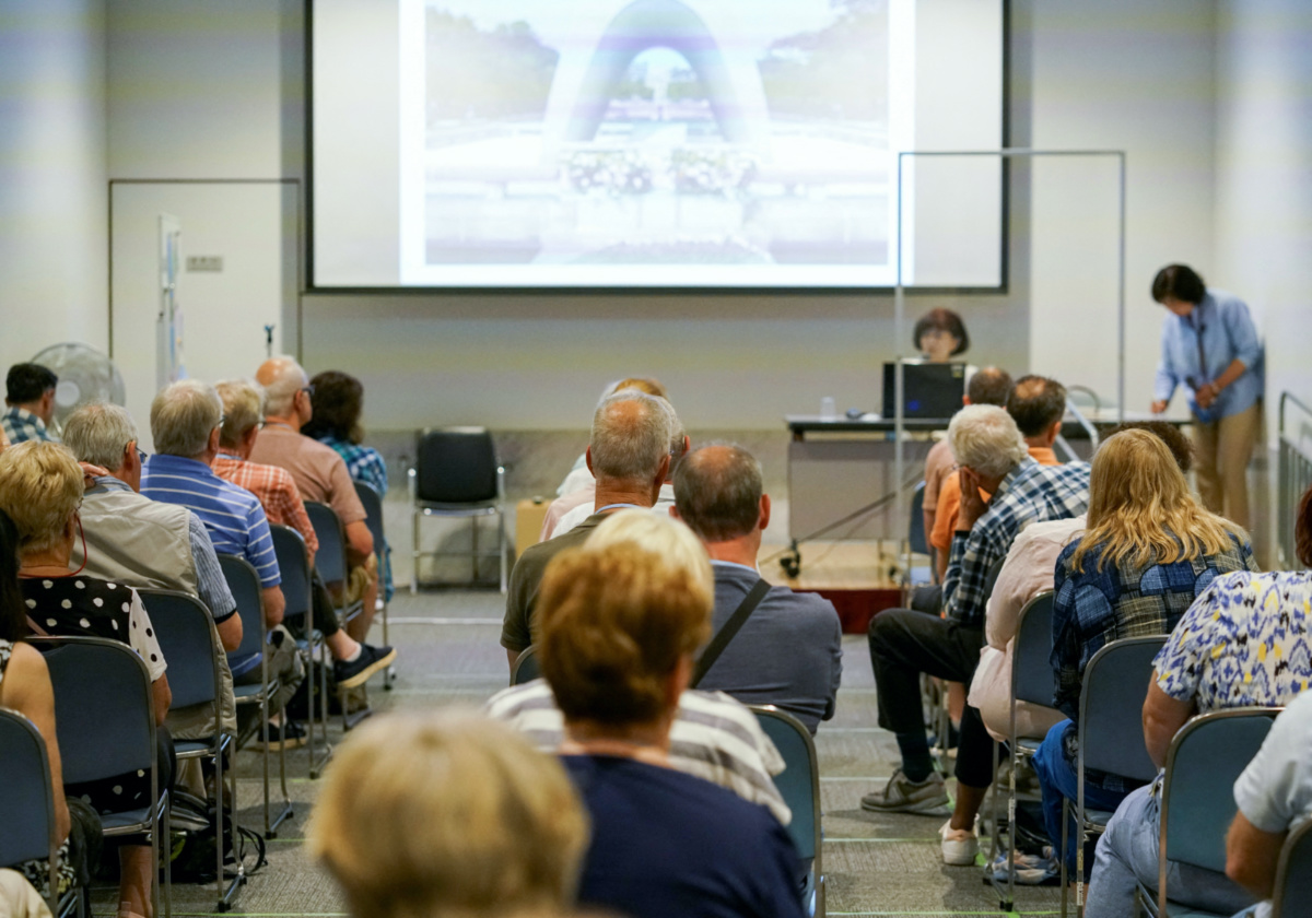 Teruko Yahata, a World War Two Hiroshima atomic bombing survivor, speaks about her story of the horrors of Hiroshima to foreign visitors at the Hiroshima Peace Memorial Museum in Hiroshima, western Japan, on 9th May, 2023. 