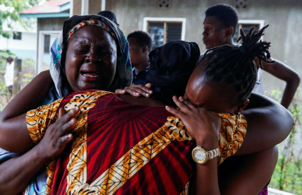 Naomi Kahindi, who lost her sister and her children, all of them followers of a Christian cult named "Good News International Church", who believed they would go to heaven, if they starved themselves to death in Shakahola, mourns at the Malindi sub district hospital mortuary in Malindi, Kilifi county, Kenya, on 26th April, 2023.