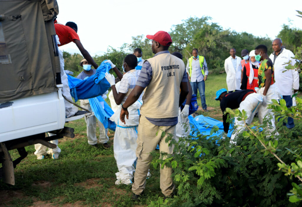 Forensic experts and homicide detectives from the Directorate of Criminal Investigations (DCI), sort exhumed bodies of suspected followers of a Christian cult named Good News International Church, who believed that they would go to heaven if they starved themselves to death, in Shakahola forest of Kilifi county, Kenya, on 11th May, 2023