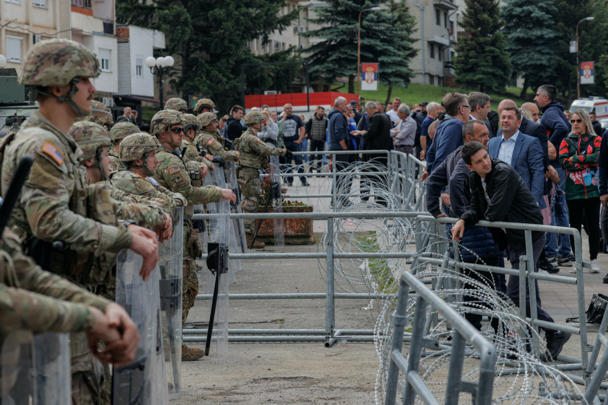 Kosovo Serbs protest as US KFOR soldiers protect the entrance of the municipality office, in the town of Leposavic, Kosovo, on 29th May, 2023
