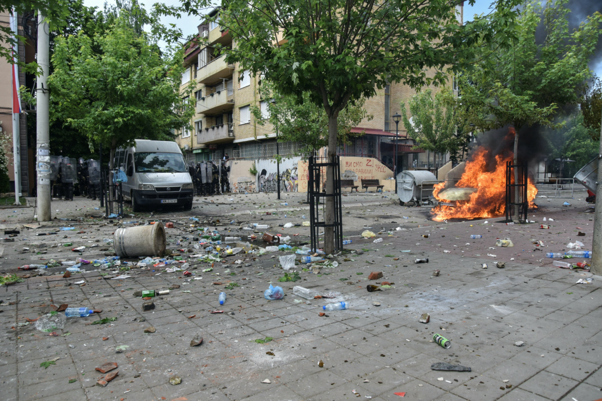 A trash container burns after NATO Kosovo Force soldiers clashed with local Kosovo Serb protesters at the entrance of the municipality office, in the town of Zvecan, Kosovo, on 29th May, 2023.