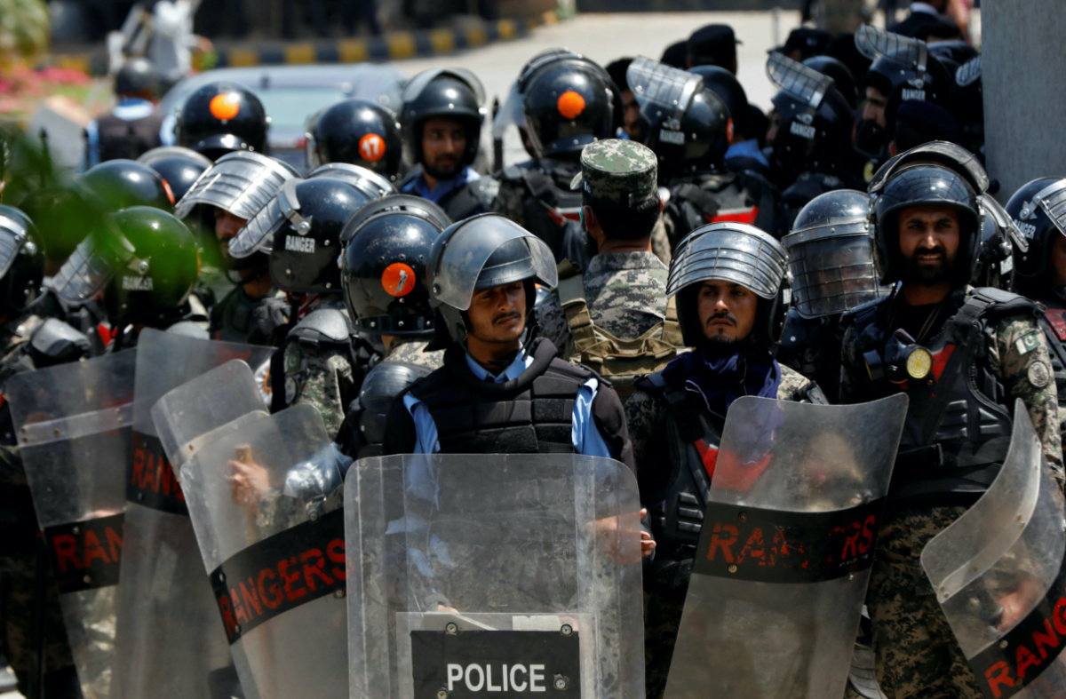 Security officers in riot gear stand guard inside the high court premises after Pakistan's former Prime Minister Imran Khan arrived to appear before the court in Islamabad, Pakistan, on 12th May, 2023.