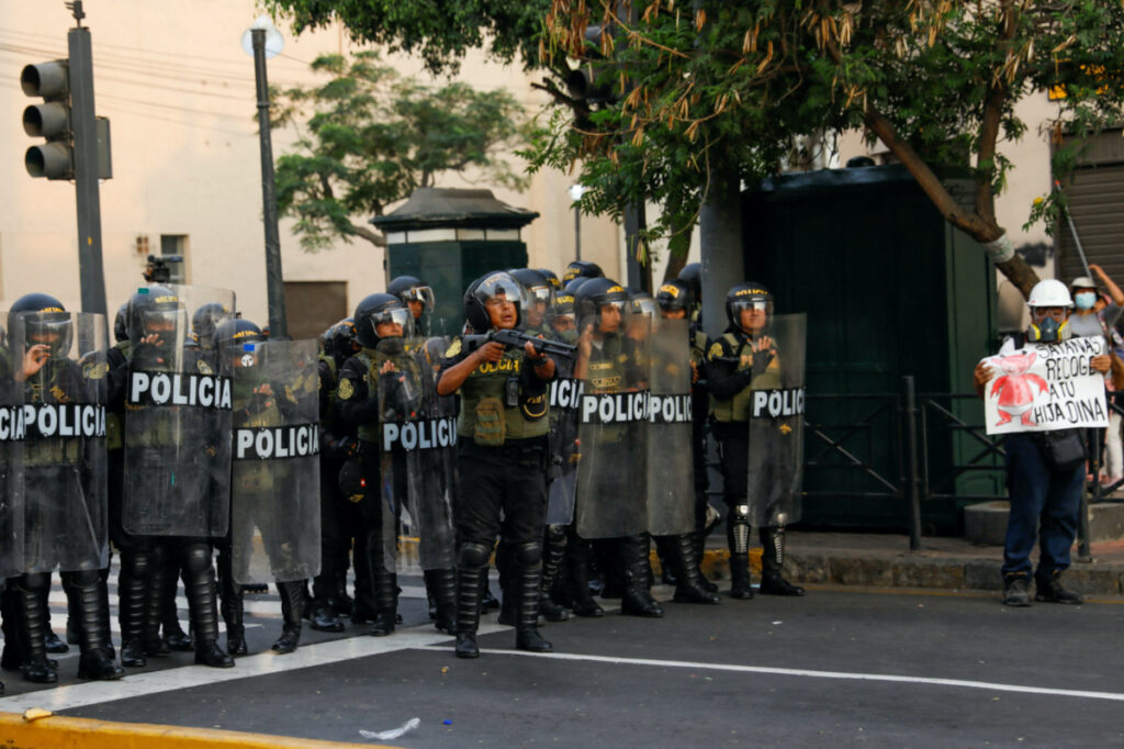 Police officers operate during a march against the government of Peru's President Dina Boluarte where demonstrators call for an indefinite nationwide strike, in Lima, Peru, on 9th February, 2023.