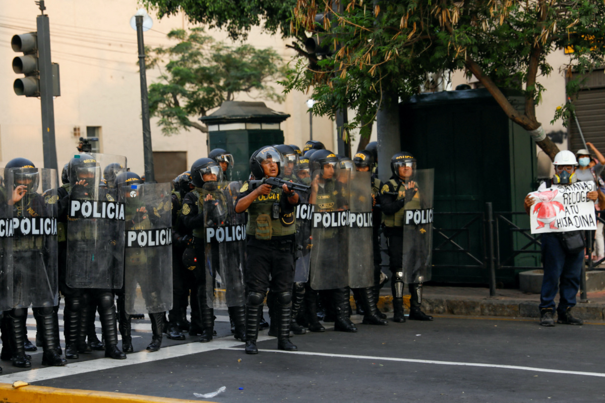 Police officers operate during a march against the government of Peru's President Dina Boluarte where demonstrators call for an indefinite nationwide strike, in Lima, Peru, on 9th February, 2023. 