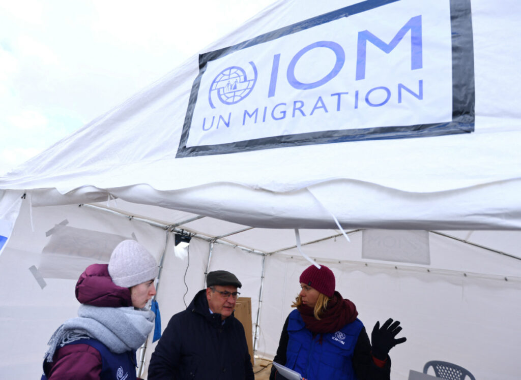 Director General of the International Organization for Migration Antonio Vitorino visits an information booth at the border checkpoint where people are crossing the border from Ukraine to Poland, after fleeing the Russian invasion of Ukraine, in Medyka, Poland, on 10th March, 2022