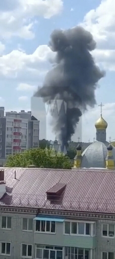 Smoke rises on the site of a helicopter crash in the town of Klintsy in the Bryansk Region, Russia, in this still image taken from video released on 13th May, 2023.