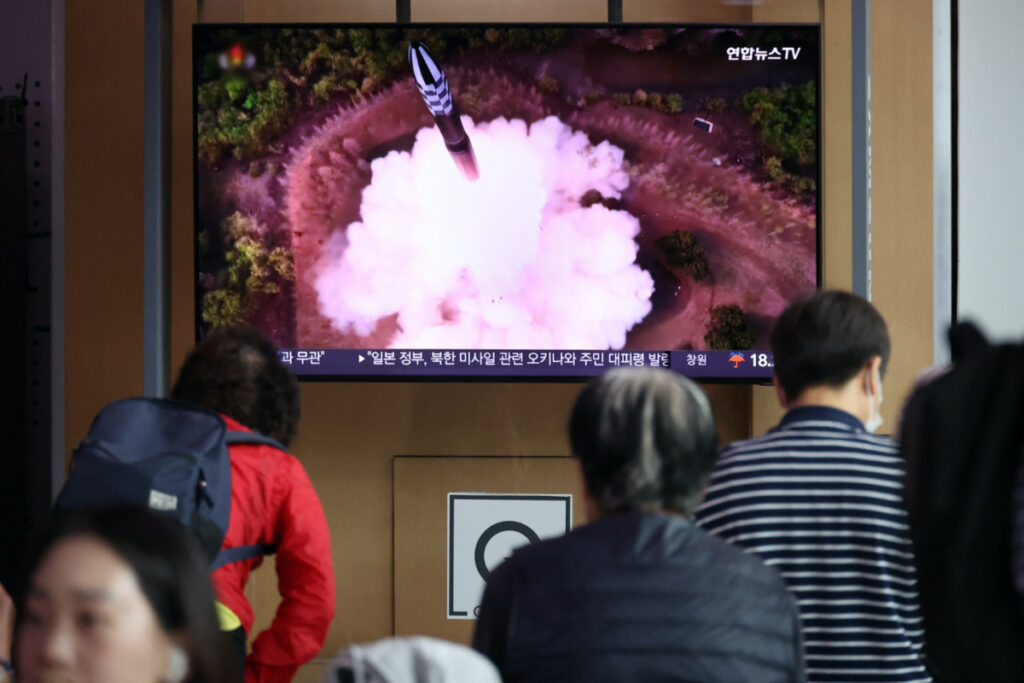 People watch a TV broadcasting a news report on North Korea firing what it called a space satellite toward the south, in Seoul, South Korea, on 31st May, 2023.