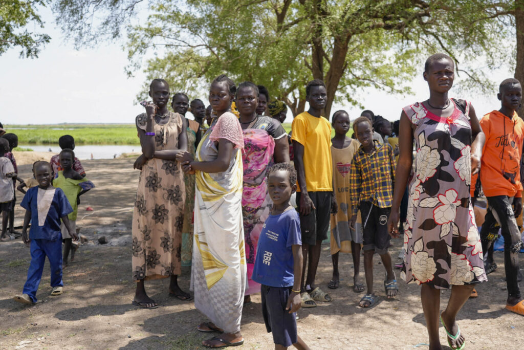 South-Sudanese who fled fighting in Sudan gather in Malakal town, which is hosting thousands who returned, in Upper Nile state, South Sudan, Sunday, on 8th May, 2023.