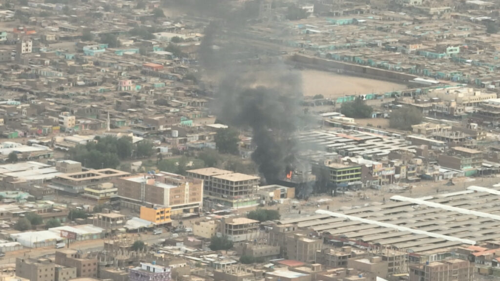 A view shows plumes of smoke and fire at an Omdurman National Bank branch, in Omdurman, Sudan, on 11th May, 2023 in this screen grab taken from a video obtained by Reuters