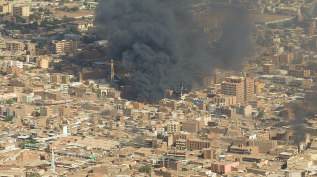 A screen grab shows black smoke and fire at Omdurman market in Omdurman, Sudan, on 15th May, 2023.