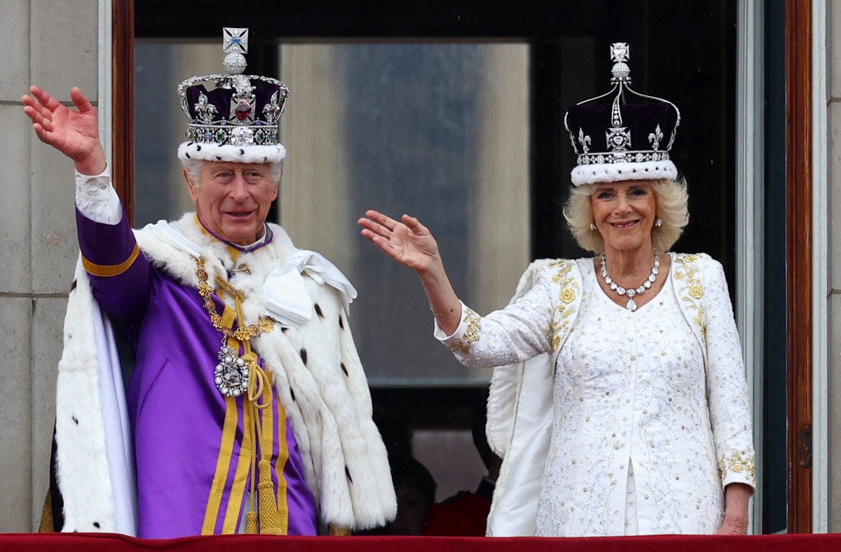 Britain's King Charles and Queen Camilla wave on the Buckingham Palace balcony following their coronation ceremony in London, Britain, on 6th May, 2023.