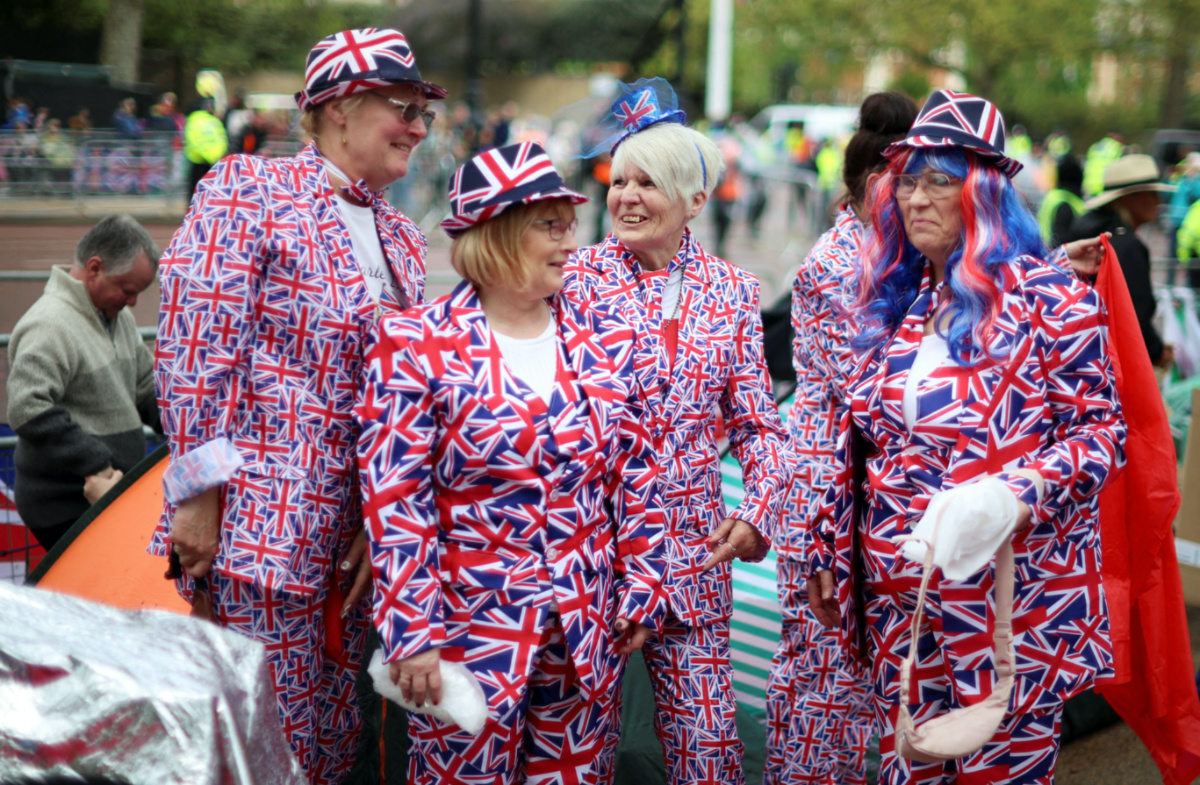 Well-wishers gather on the Mall outside Buckingham Palace ahead of the coronation of Britain's King Charles and Camilla, Queen Consort, in London, Britain, on 5th May, 2023