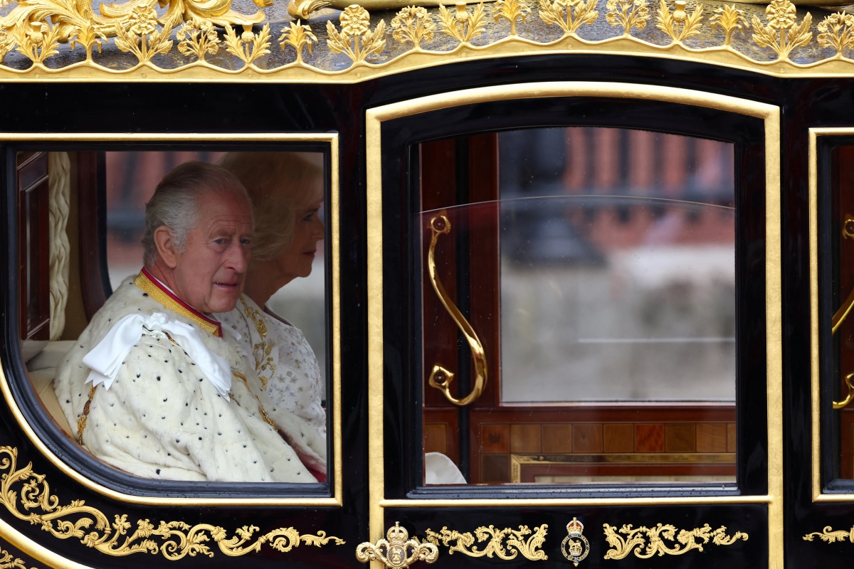 Britain's King Charles and Queen Camilla sit in Diamond Jubilee State Coach at Buckingham Palace on the day of coronation ceremony, in London, Britain, on 6th May 2023.