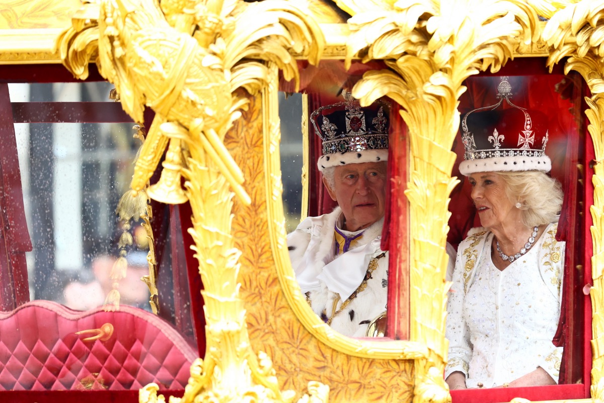 Britain's King Charles and Queen Camilla travel from Westminster Abbey in the Gold State Coach, following their coronation ceremony, in London, Britain, 6th May, 2023